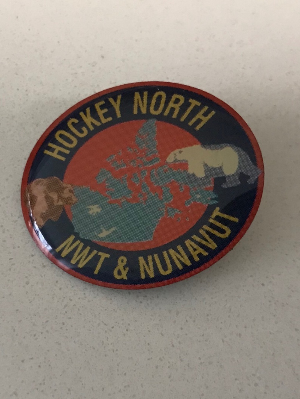 Hockey North NWT & Nunavut Lacquered Lapel Hat Brooch Pin
